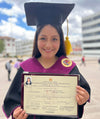 Paka scholar Lady Diana holding her degree diploma