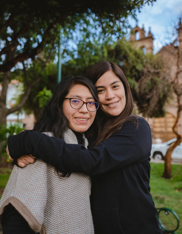 Gisella hugging Jennifer, one of our Paka scholars