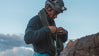 Front view of Ultralight Crew alpaca midlayer showcasing lightweight knit texture and V-neck on plain background