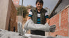 A man holding one of our Costa sweaters to air flat dry