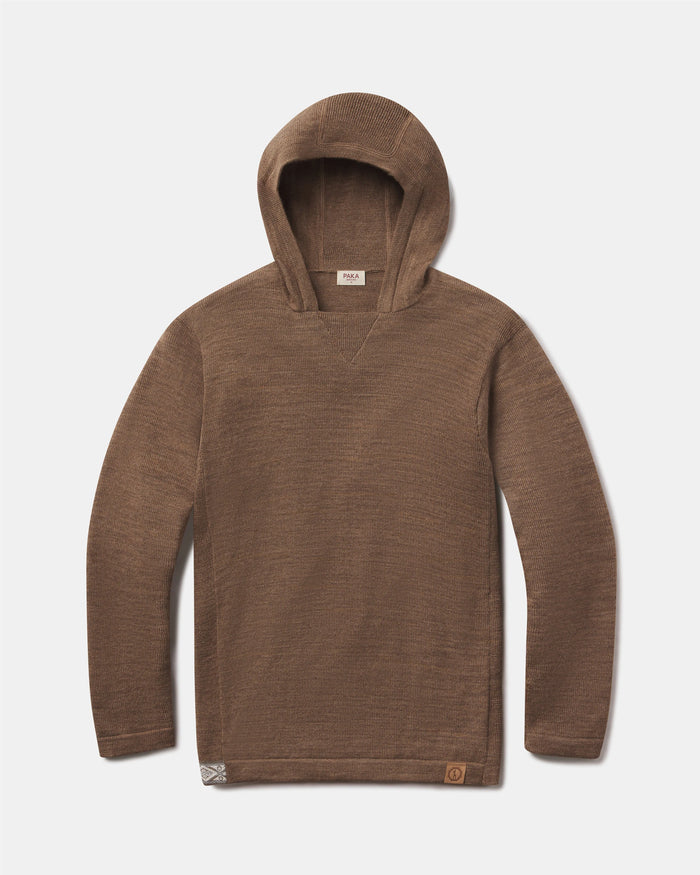 Front flat-lay of The Hoodie alpaca hoodie in Cafe Heather with V-stitch neck and logo patch on light gray