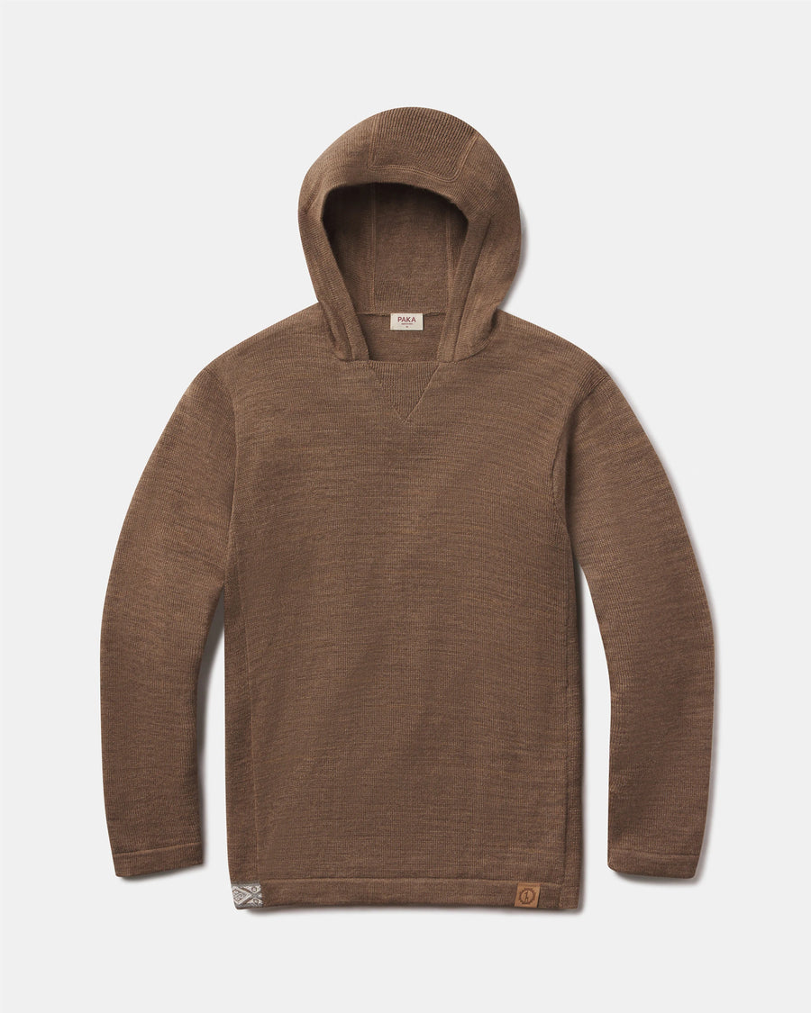 Front flat-lay of The Hoodie alpaca hoodie in Cafe Heather with V-stitch neck and logo patch on light gray