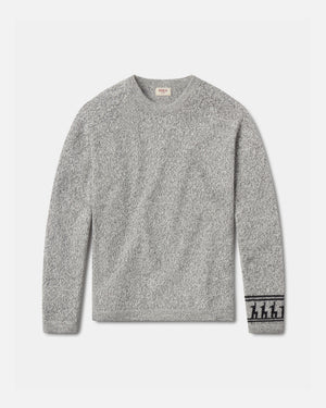 Front flat lay of The Costa alpaca sweater showcasing textured knit and patterned cuff in light grey on a light background