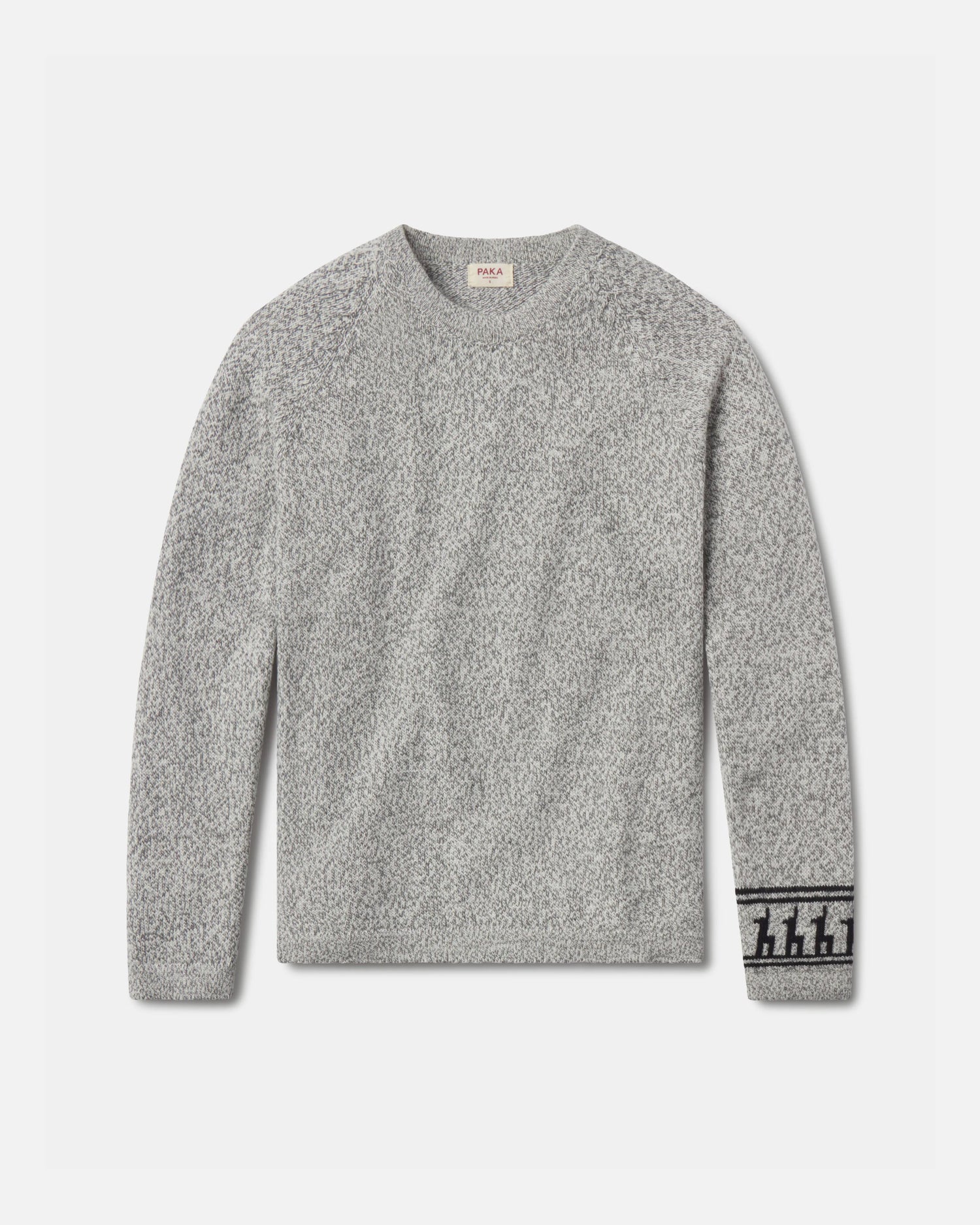 Front flat lay of The Costa alpaca sweater showcasing textured knit and patterned cuff in light grey on a light background