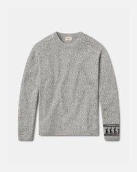 Front flat lay of The Costa alpaca sweater showcasing textured knit and patterned cuff in light grey on a light background