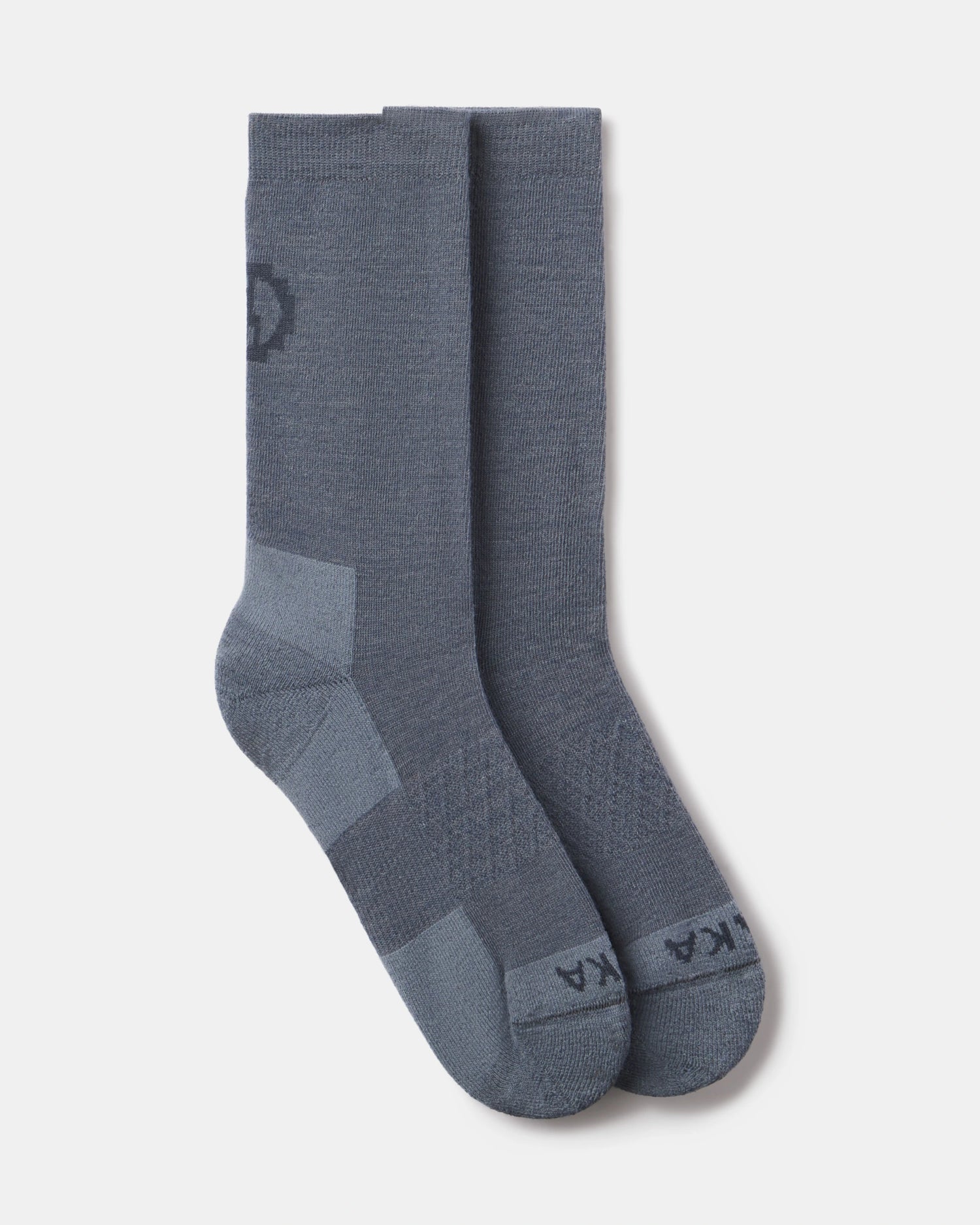 Top view of Essential Crew socks in indigo with reinforced heel and toe and cushioned knit panels on white