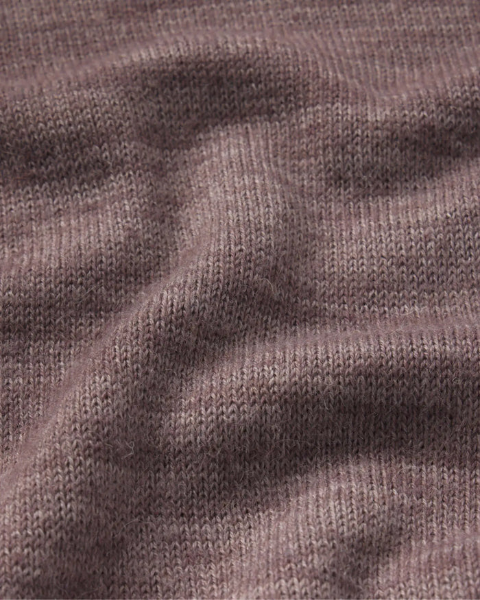 Close-up of The Original Crew sweater showcasing soft alpaca knit texture and brushed fibers in raisin color