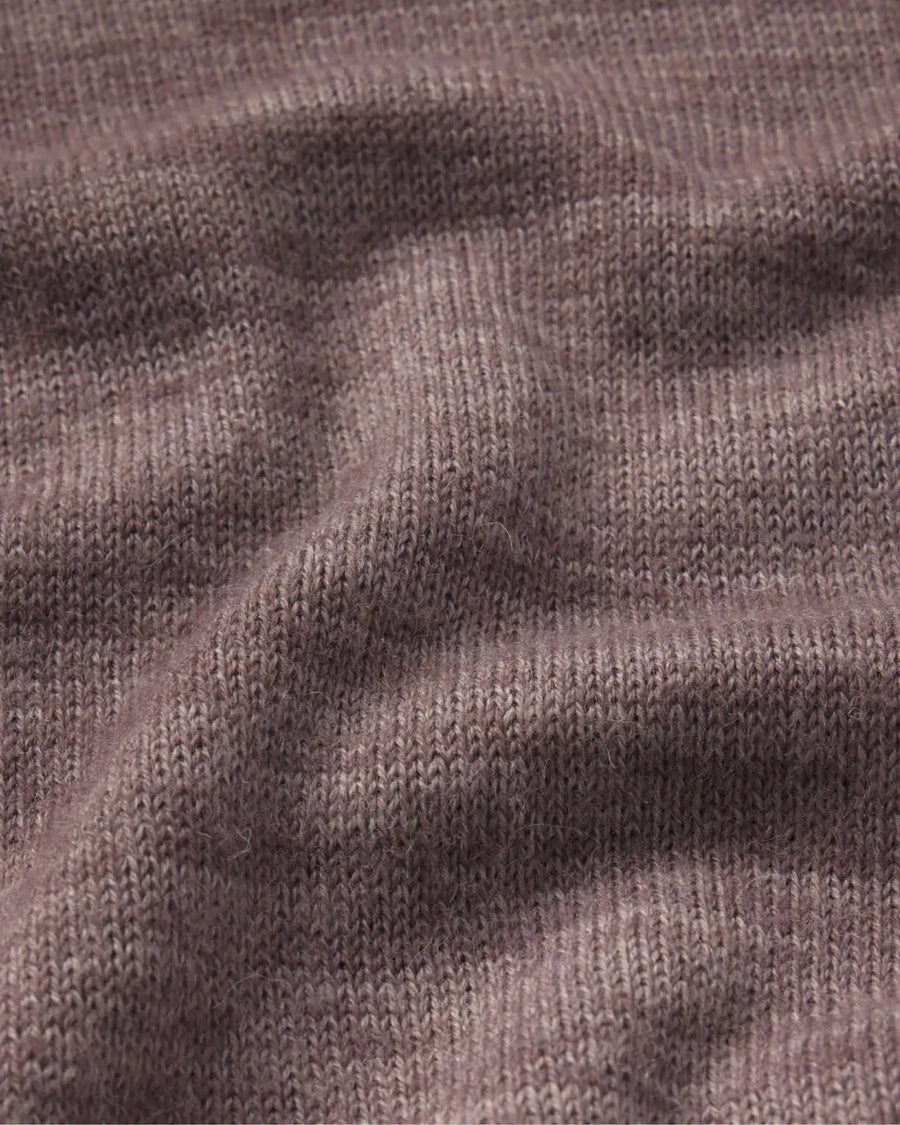 Close-up of The Original Crew sweater showcasing soft alpaca knit texture and brushed fibers in raisin color