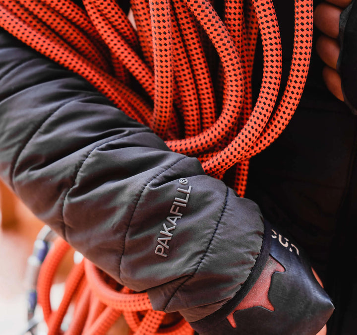 A women wearing her Pakafill puffer jacket. It says 