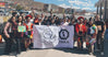 PAKA team and 17 Peruvian scholarship recipients posing outdoors during the 2024 scholarship announcement