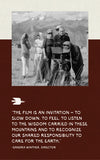 Poster showing black-and-white film-crew photo in the mountains and a quote inviting to slow down and care for the earth