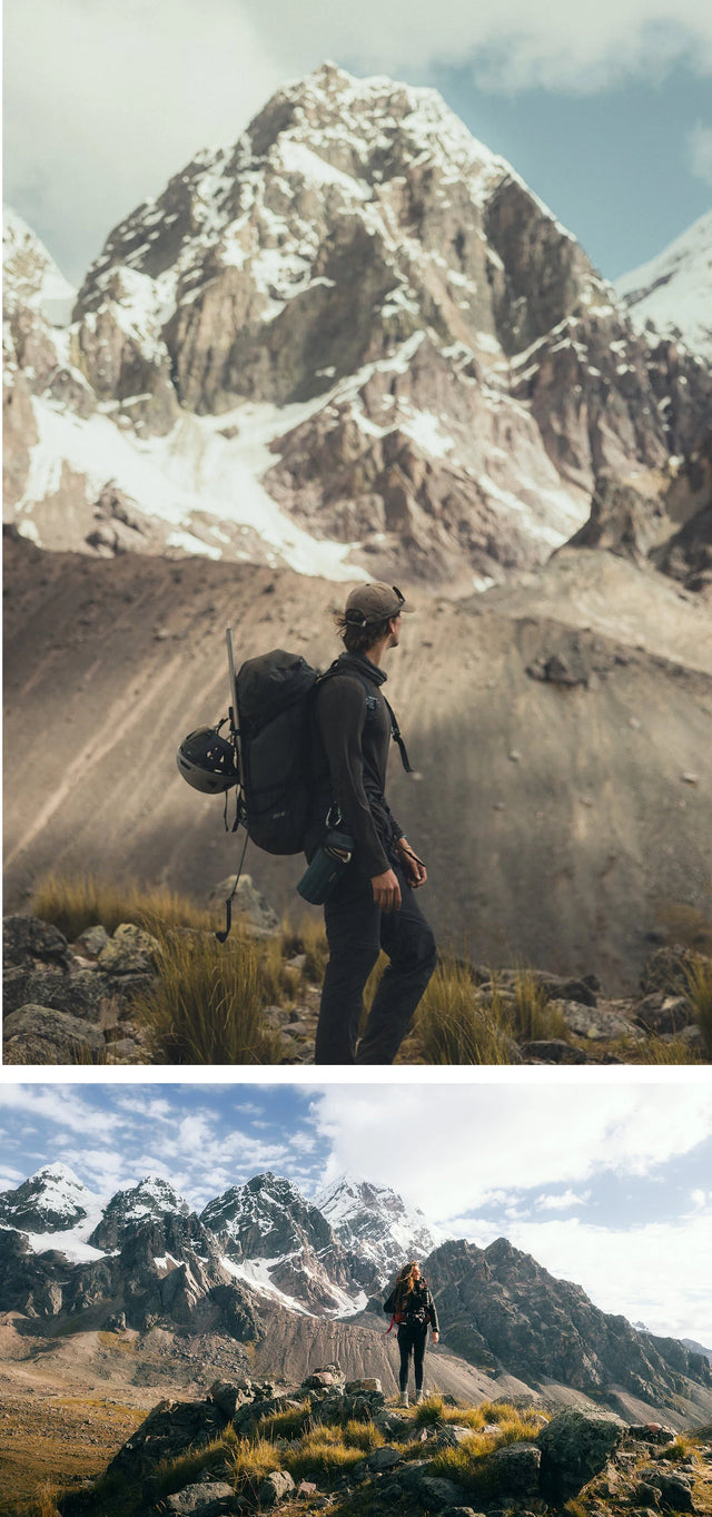 Hiker with backpack gazing at a towering snow-capped mountain; below, two hikers trekking along a rocky ridge