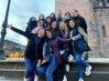 Our Paka team and our scholars smiling in Cusco