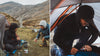 Man in black Breathe Zip Hoodie crouching in a tent as another hiker lights a camp stove by a mountain stream