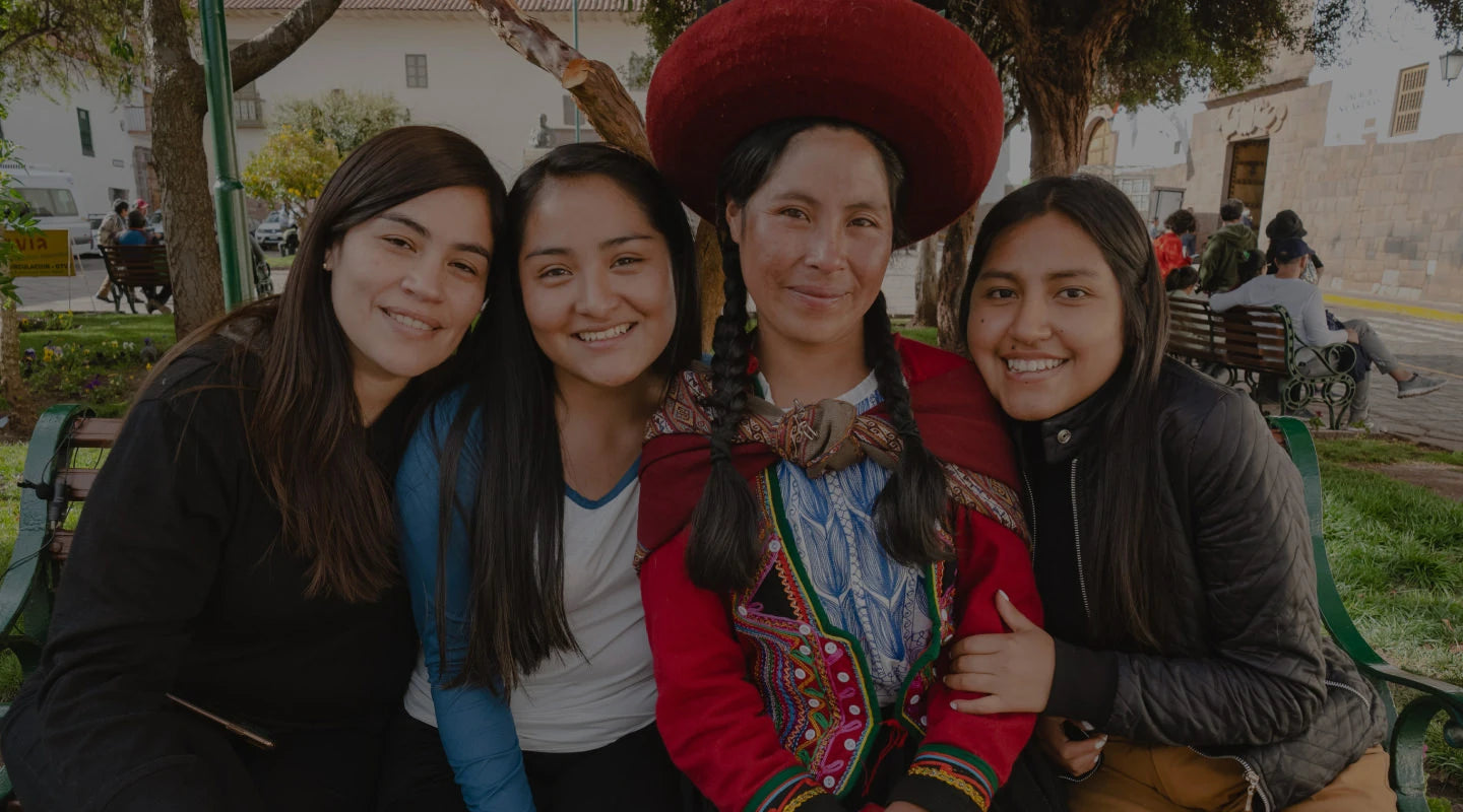 Gisella, our head of Peru, and Paka scholars. Noemi is wearing her traditional dress 