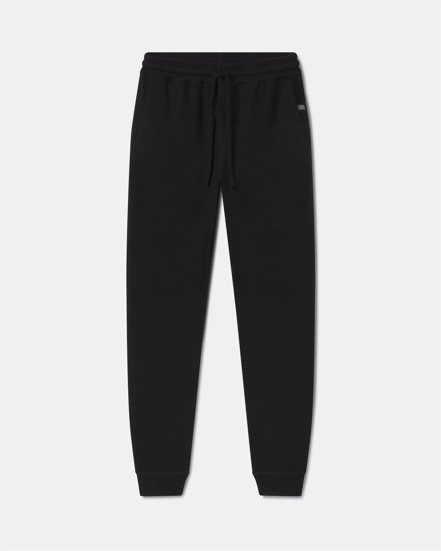 Front view of Men’s Breathe Jogger in black showing drawstring waistband and tapered cuffs on light gray background