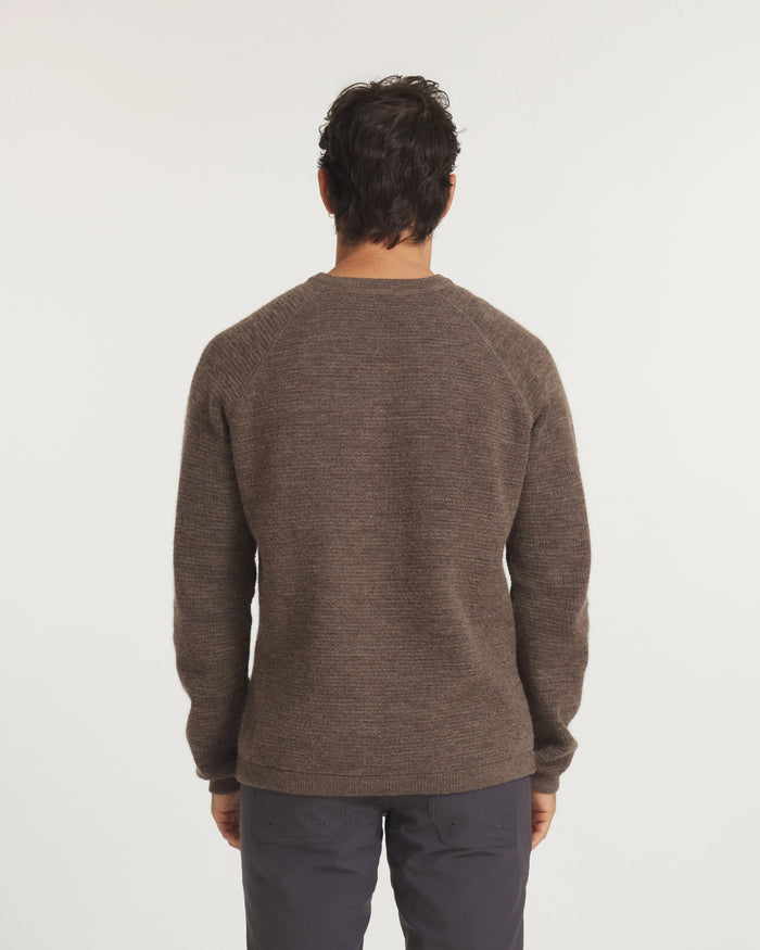 Rear view of Men’s Mountain Crew sweater in brown showcasing raglan sleeves and textured two-tone knit on white background