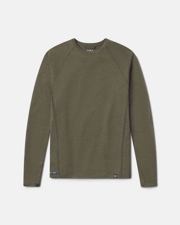 Flat front view of Men’s Sol Crew long sleeve UPF shirt in Andean Moss showing crew neck and raglan sleeves on light gray