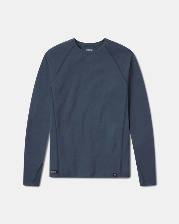 Front flat lay of Men’s Sol Crew long-sleeve UPF sun shirt in navy showing raglan sleeves and hem tag on white background