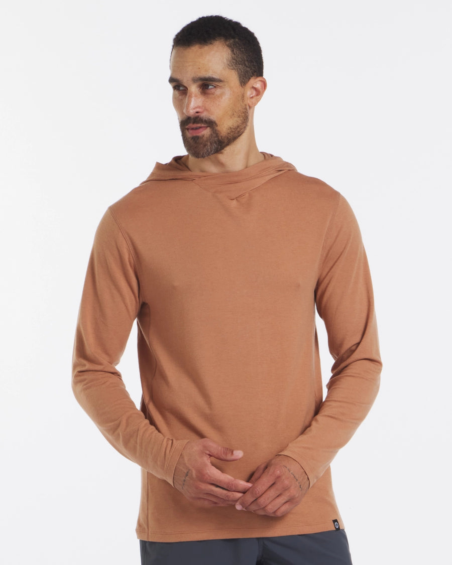 Three-quarter front of Men’s Sol Hoodie in Sienna showcasing lightweight alpaca-Tencel fabric, hood, and slim fit on a white background