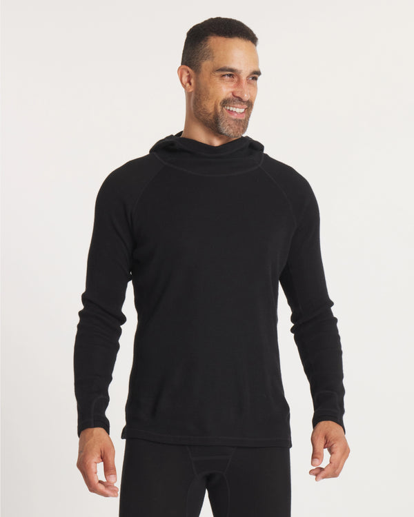 Front view of Men’s thermal hoodie in black showing slim fit, raglan sleeves and ergonomic hood on light studio background