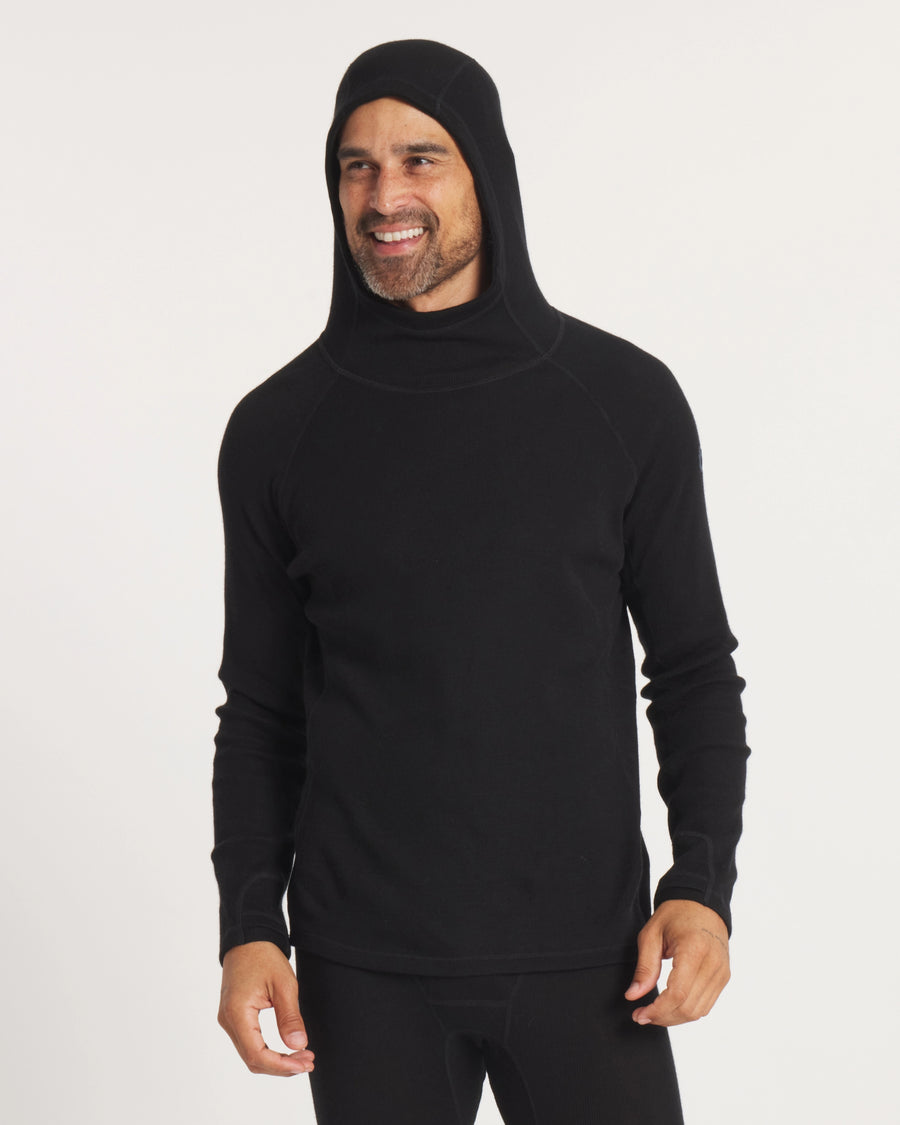 Model Smiling with Hood Up on Men's Breathable Thermal Hoodie Baselayer in Black – PAKA Apparel
