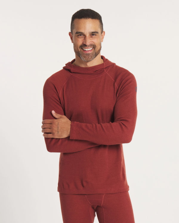 Front view of clay thermal hoodie on model, slim fit with ergonomic hood, raglan sleeves, flat coverstitch, white background
