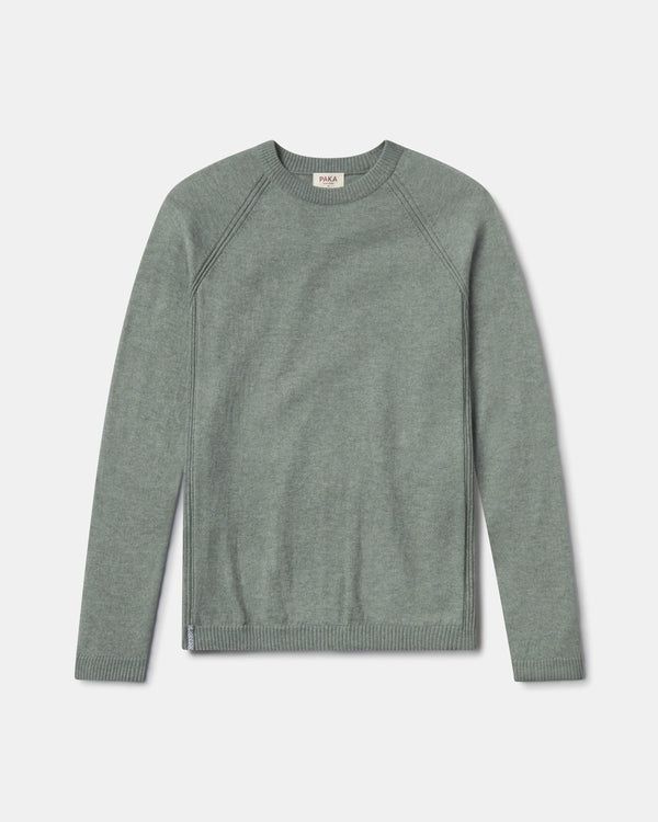 Front flat lay of Men’s Ultralight Crew sweater in lichen green showcasing raglan seams and ribbed cuffs and hem on light gray background
