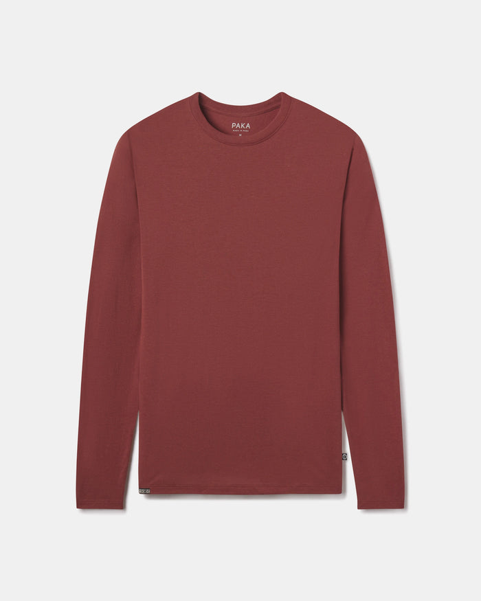 Front flat lay of Men’s Aire long sleeve alpaca shirt showcasing crew neck and long sleeves with light gray background