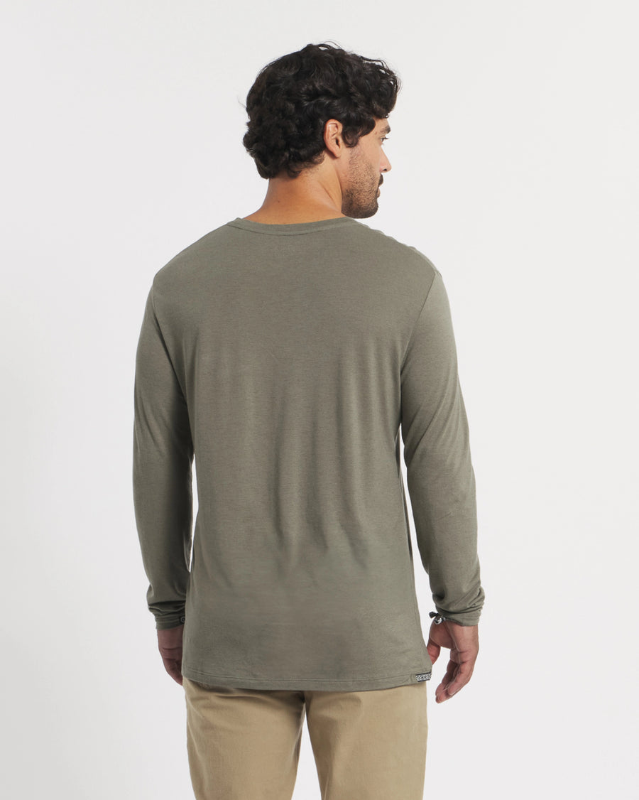 Back view of Men’s Aire Long Sleeve shirt showcasing lightweight alpaca fabric and relaxed fit on plain white background
