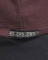 Close-Up of Inca ID on Men's Aire Long Sleeve Hiking Shirt in Fig / Purple – PAKA Apparel