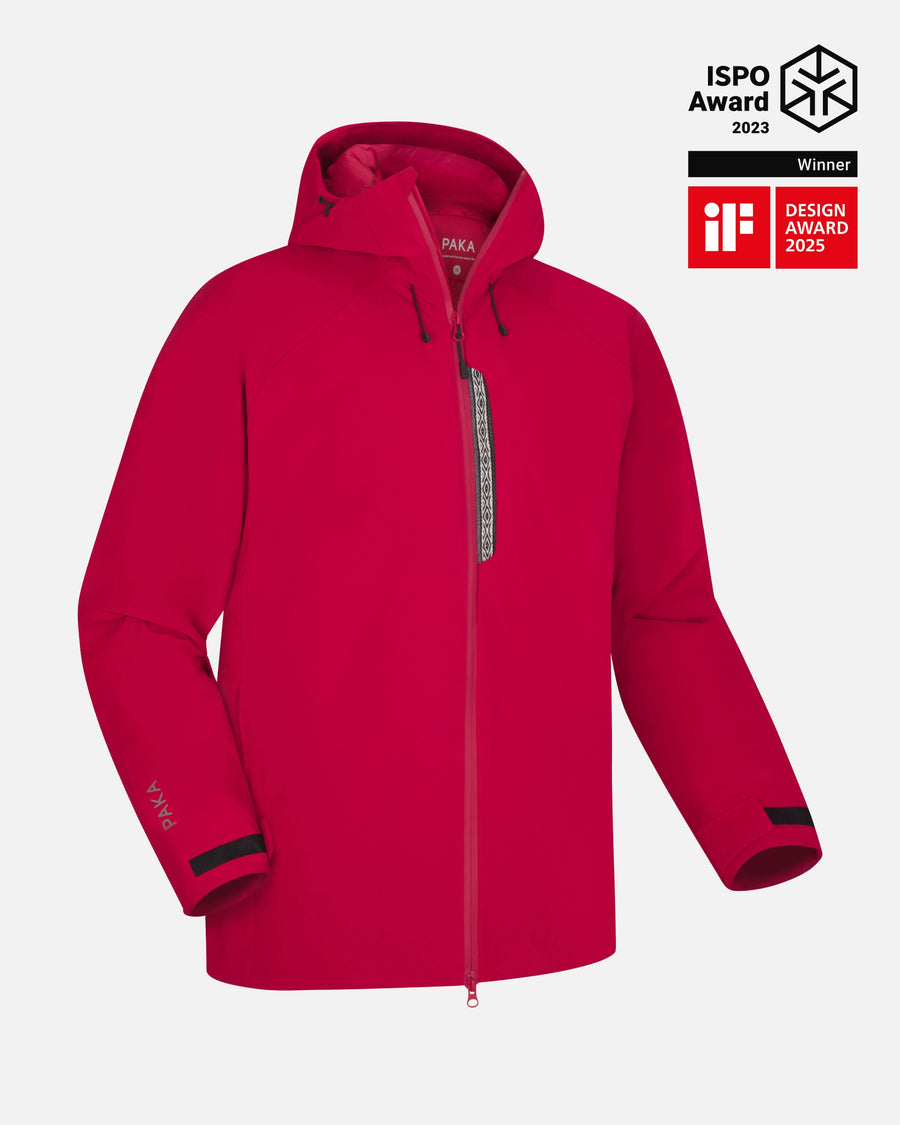 Front view of Men’s Apu Parka in red with hood, full-length zipper, chest zip pocket and PAKA logo on cuff on gray background