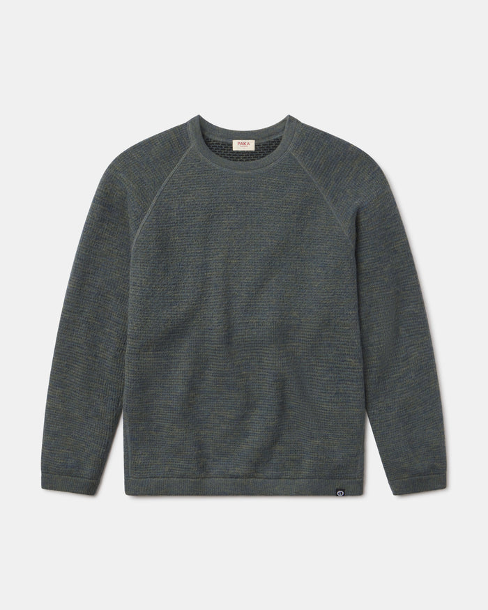 Front view of Men’s Mountain Crew sweater showing raglan sleeves and two-tone forest knit on plain background