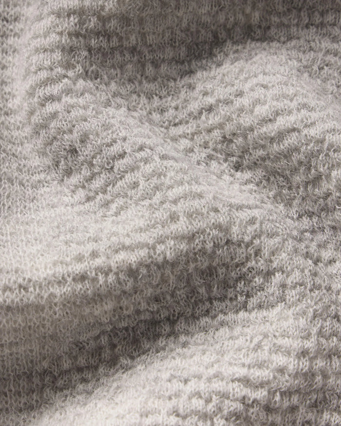 Close-up of a textured  Light Grey fabric surface