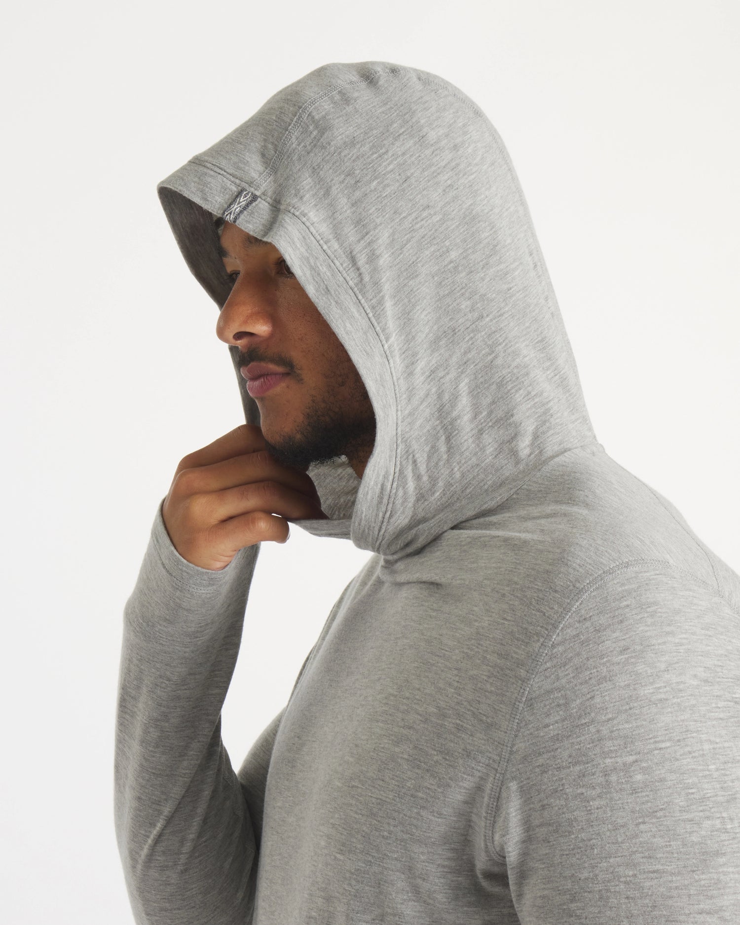 Close-Up of Hood Up on Model in Sol Men's Alpaca Sun Protection Hoodie – PAKA Apparel