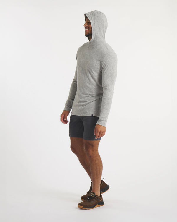 Sideview of Model Standing in Heather Grey Sol UPF Lightweight Sun Hoodie – PAKA Apparel
