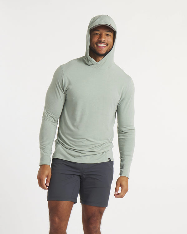 Man Wearing Sol Sun Protection Hoodie in Lichen / Light Green with Hood Up – PAKA Apparel