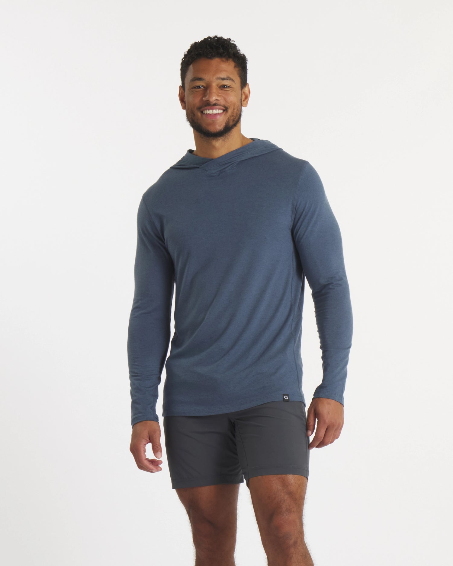 Model Standing in Navy Sol Men's Lightweight Sun Hoodie – PAKA Apparel