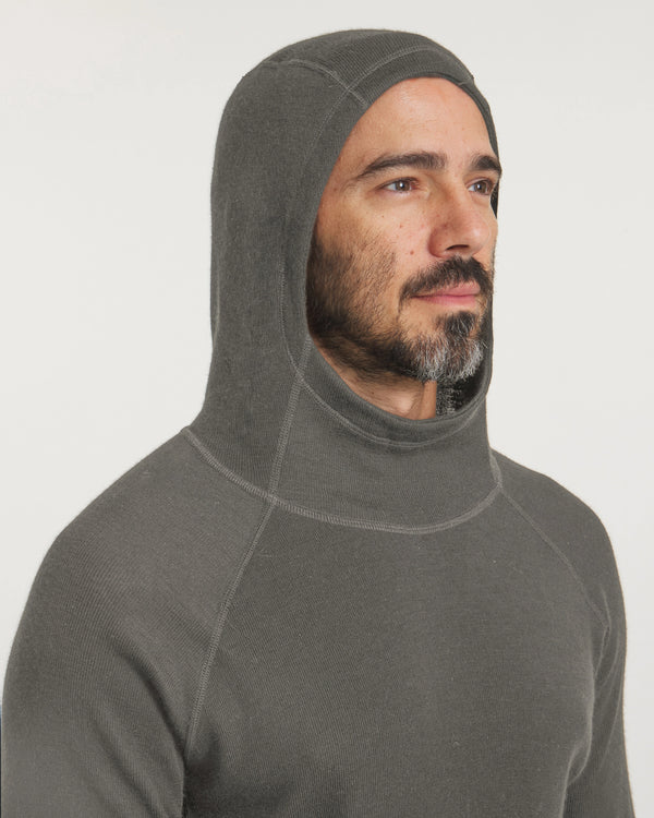 Three-quarter profile of Men’s Thermal Hoodie showcasing the ergonomic hood, raglan sleeves, and flat coverstitch seams on a light studio background