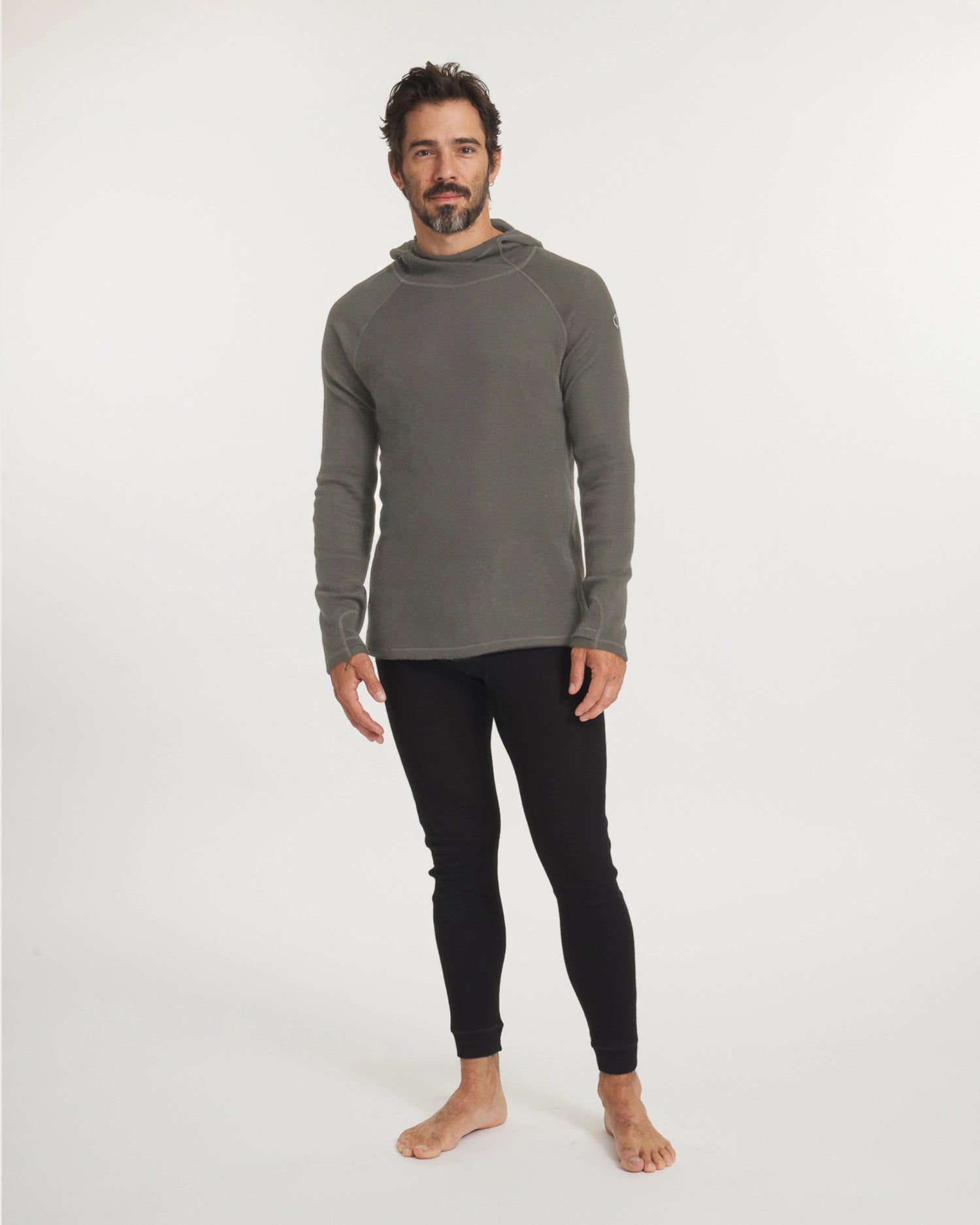Full-length Men’s Thermal Hoodie in Andean Moss on model showing ergonomic hood, slim fit and raglan sleeves