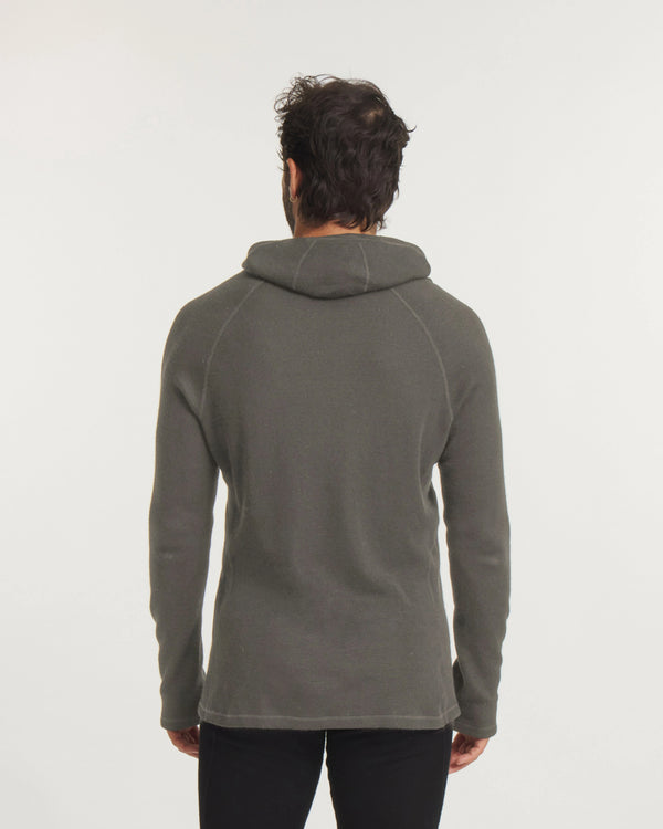 Back view of Men’s Thermal Hoodie in Andean Moss showing ergonomic hood, raglan seams and slimmer fit on light background