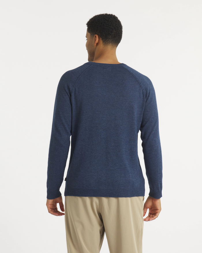 Rear view of Men’s Ultralight 1.0 Crew alpaca crewneck showcasing raglan sleeves and lightweight navy knit on white background