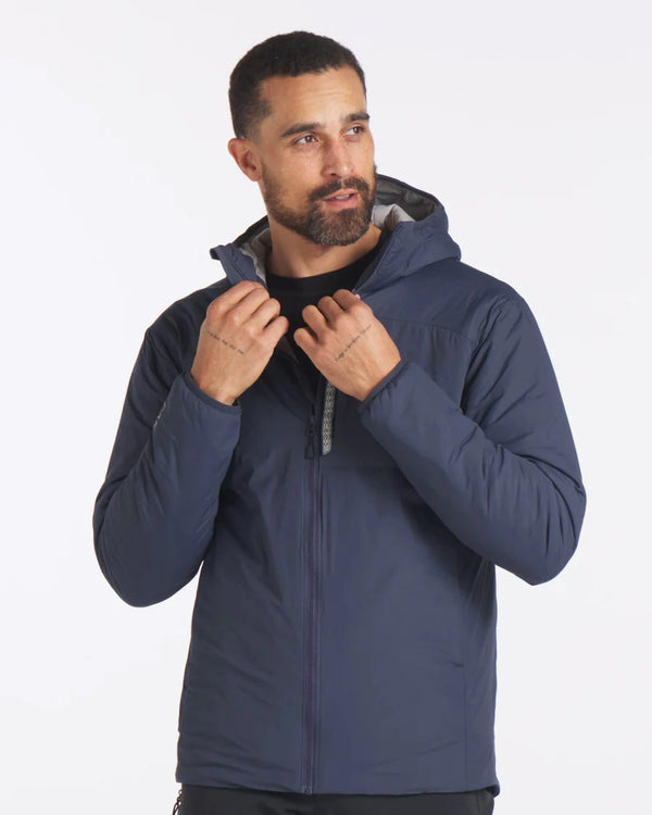Front view of men’s Apu lightweight navy puffer jacket with hood, slim fit and full front zipper on model against white background