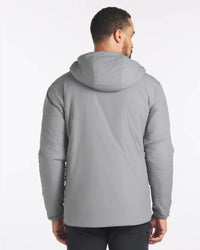 Rear view of Men’s Apu puffer jacket in Storm showing hood and quilted fill on model against white background