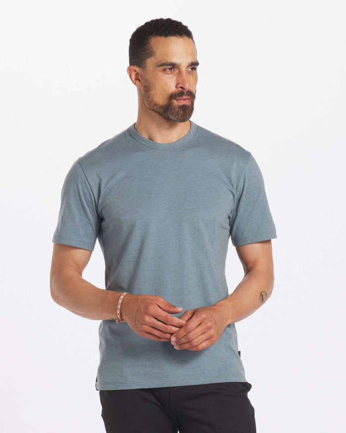 Man Looking Off Camera in Men's Organic Pima Cotton and Alpaca T-Shirt in Steel / Light Blue – PAKA Apparel