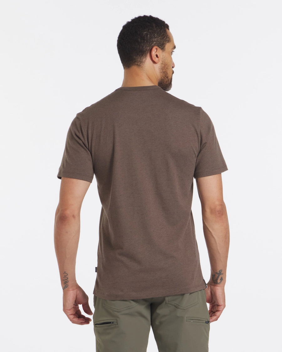Back view of Men’s Tee in Wood on male model showing short sleeves and regular fit against a white background