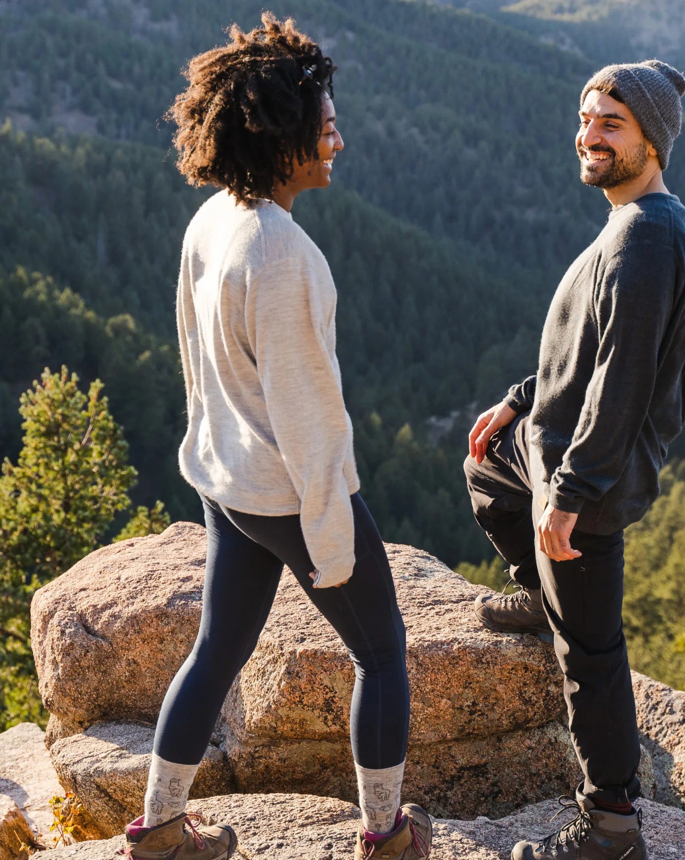 Woman in grey Mountain Crew alpaca sweater 