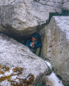 Hiding in a rock during the hailstorm