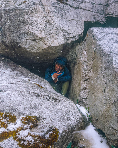 Hiding in a rock during the hailstorm