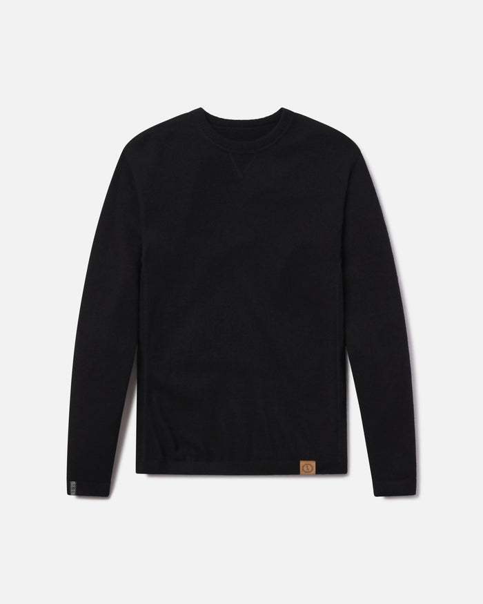 Front view of Lightweight Crew sweater in black showcasing crewneck, long sleeves, and leather logo patch on white background